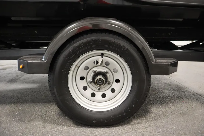 Slide: The Image of Trailer wheel for 2012 Sea-Doo GTR 215, featuring a sturdy black fender. - 37