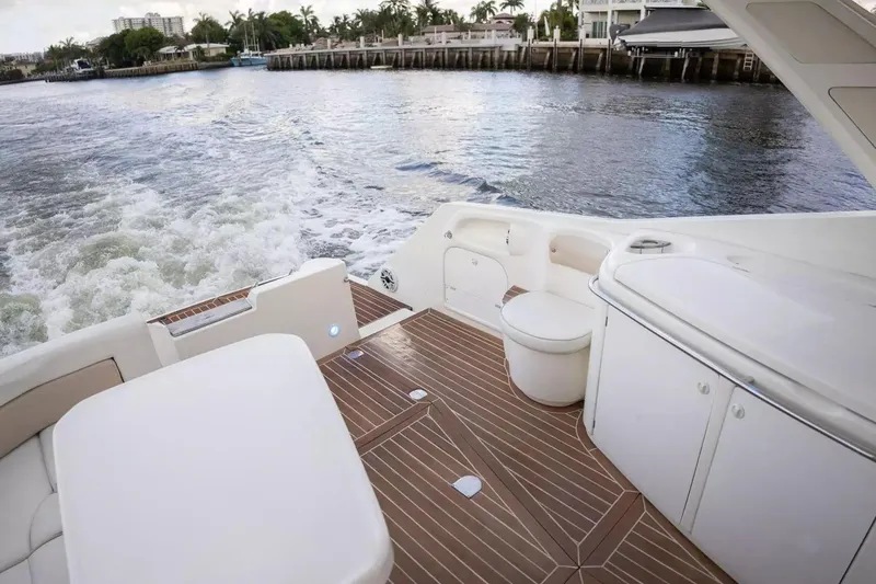 Slide: The Image of 1999 Cranchi Mediterranee 41 yacht deck with seating and water view. - 7