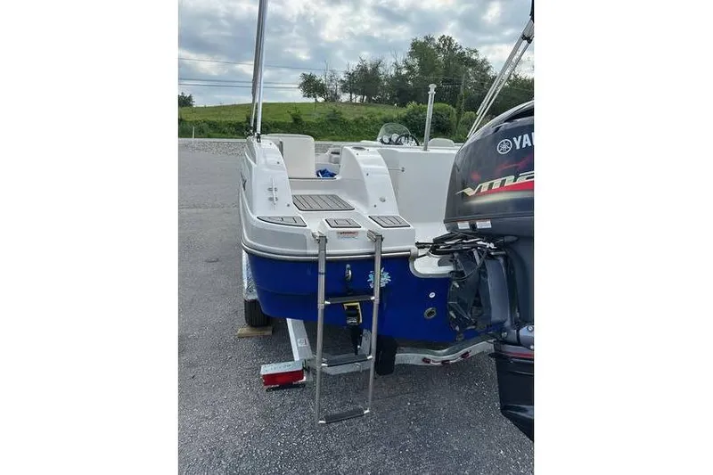 Slide: The Image of 2021 Starcraft 1915 OB Limited boat with Yamaha engine and rear ladder. - 11