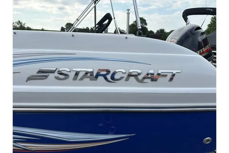 Slide: The Image of 2021 Starcraft 1915 OB Limited boat with sleek design and Yamaha engine. - 14