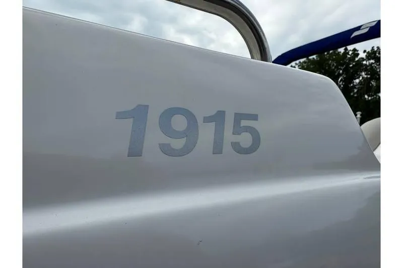 Slide: The Image of Close-up of 2021 Starcraft 1915 OB Limited boat model number on hull. - 15