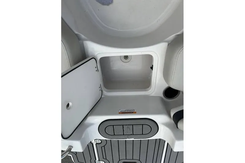 Slide: The Image of 2021 Starcraft 1915 OB Limited boat storage compartment with open hatch. - 25