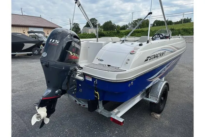 Slide: The Image of 2021 Starcraft 1915 OB Limited boat with Yamaha 115 VMAX engine on trailer. - 3