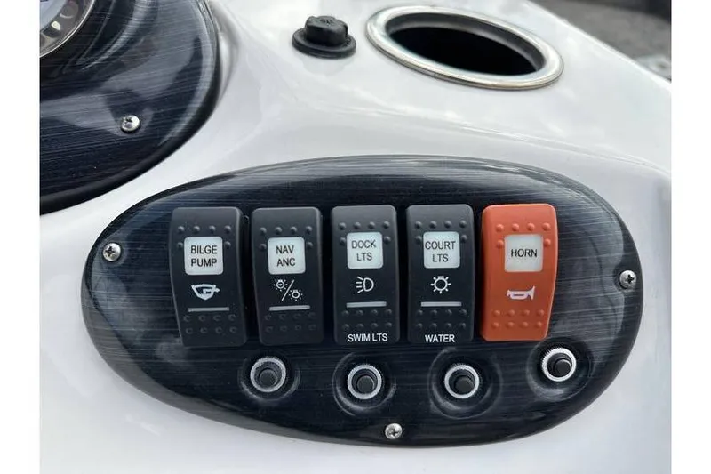 Slide: The Image of Control panel of a 2021 Starcraft 1915 OB Limited boat with labeled switches. - 30