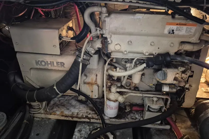 Slide: The Image of Engine room of 1991 Carver 36 Aft Cabin Motor Yacht with Kohler generator. - 42