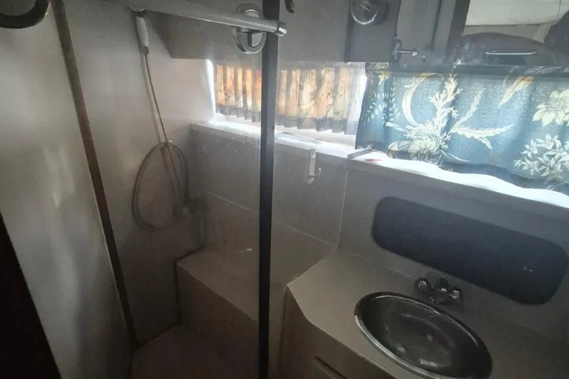 Slide: The Image of Bathroom interior of 1991 Carver 36 Aft Cabin Motor Yacht with shower and sink. - 34