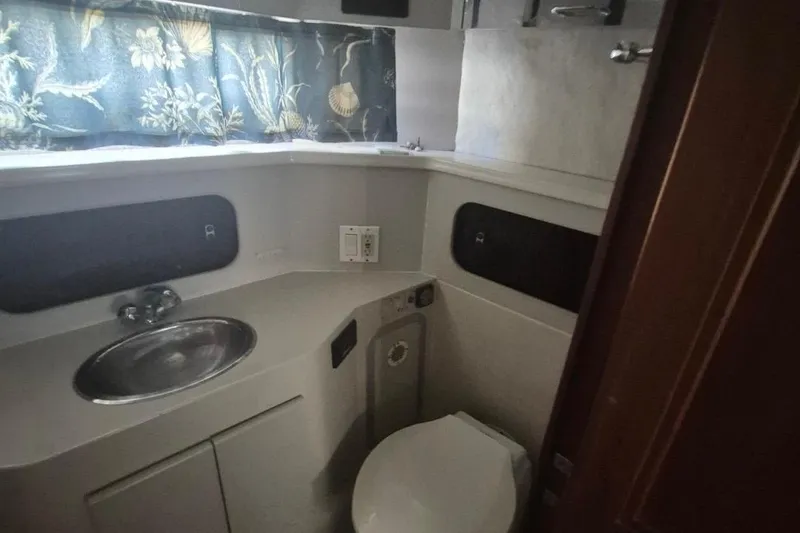 Slide: The Image of Bathroom interior of 1991 Carver 36 Aft Cabin Motor Yacht with sink and toilet. - 35