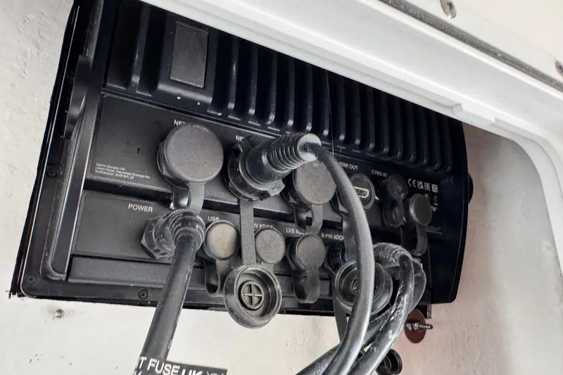 Slide: The Image of Electrical panel with cables on a 2025 Sea Fox 288 Commander boat. - 103