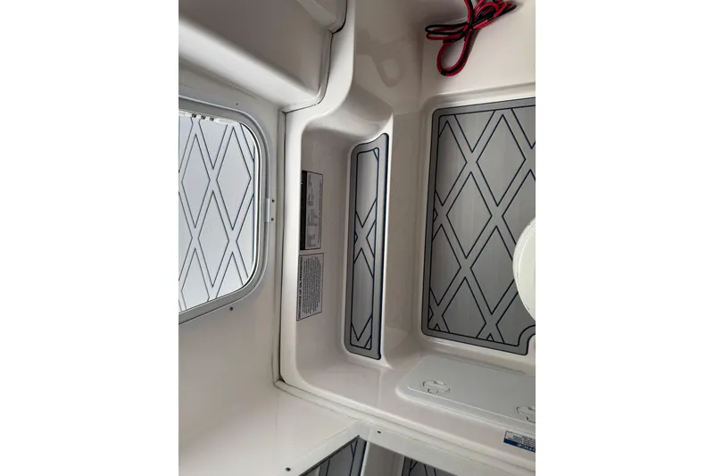 Slide: The Image of Interior view of 2025 Sea Fox 288 Commander boat with patterned panels. - 106
