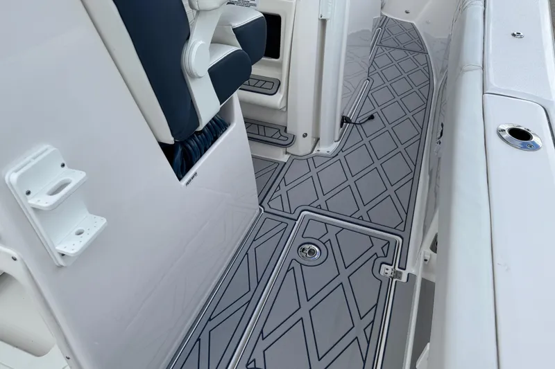 Slide: The Image of 2025 Sea Fox 288 Commander boat interior with sleek, modern flooring and seating. - 110