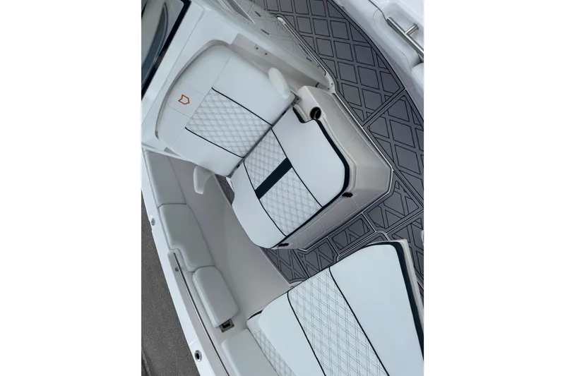 Slide: The Image of 2025 Sea Fox 288 Commander boat interior with white and gray diamond-patterned seating. - 112