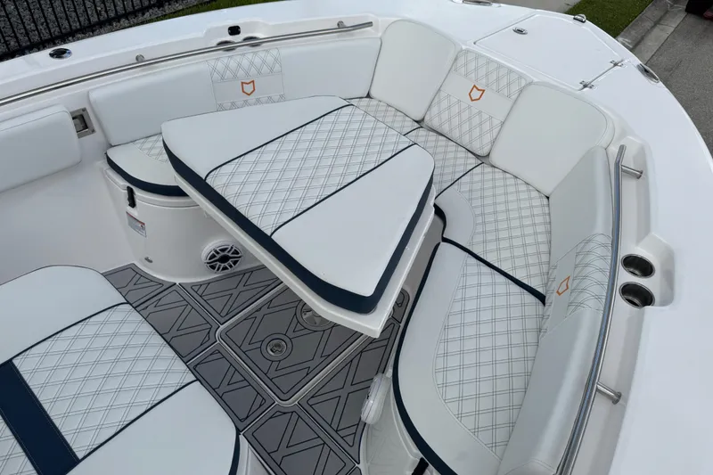 Slide: The Image of 2025 Sea Fox 288 Commander boat interior with cushioned seating and stylish design. - 132