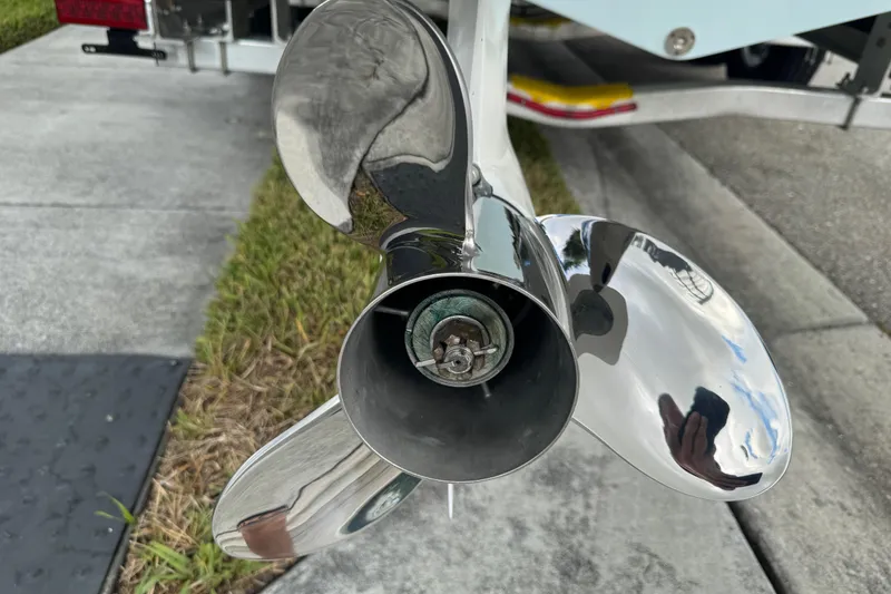 Slide: The Image of Close-up of a 2025 Sea Fox 288 Commander boat propeller, shiny and reflective. - 17