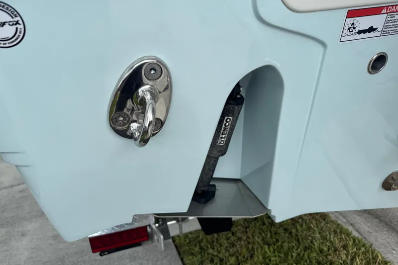 Slide: The Image of Close-up of 2025 Sea Fox 288 Commander boat's rear hardware and trim tab. - 19