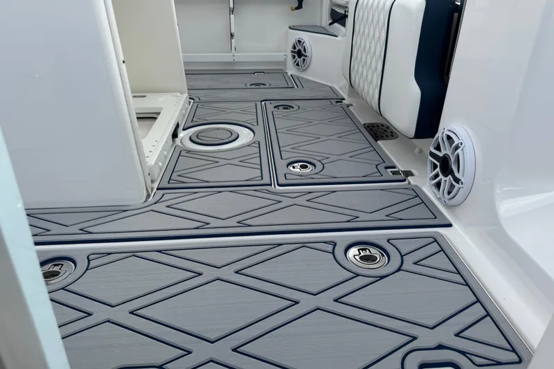 Slide: The Image of 2025 Sea Fox 288 Commander boat deck with stylish, non-slip flooring and integrated speakers. - 23