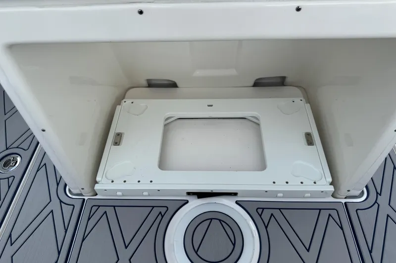 Slide: The Image of 2025 Sea Fox 288 Commander boat storage compartment with sleek design and durable flooring. - 31