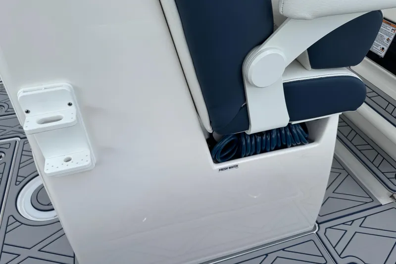 Slide: The Image of 2025 Sea Fox 288 Commander boat interior with seating and fresh water storage. - 36