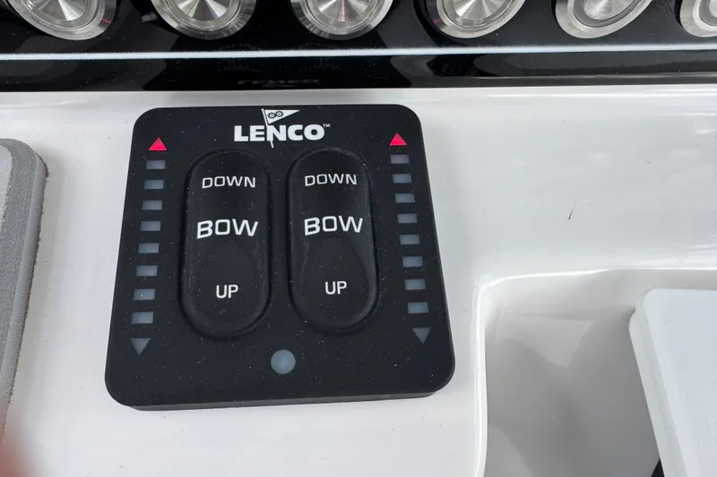 Slide: The Image of Lenco trim tab control panel on 2025 Sea Fox 288 Commander boat dashboard. - 43