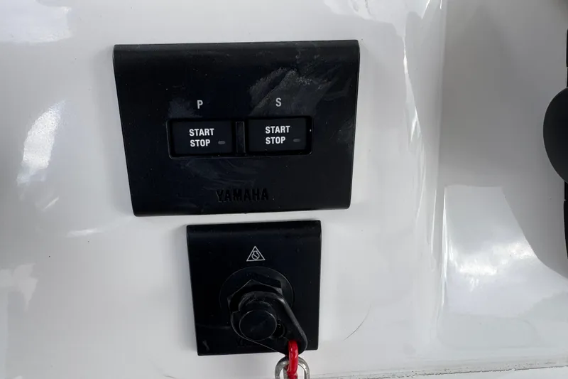 Slide: The Image of Yamaha start-stop controls on 2025 Sea Fox 288 Commander boat dashboard. - 44