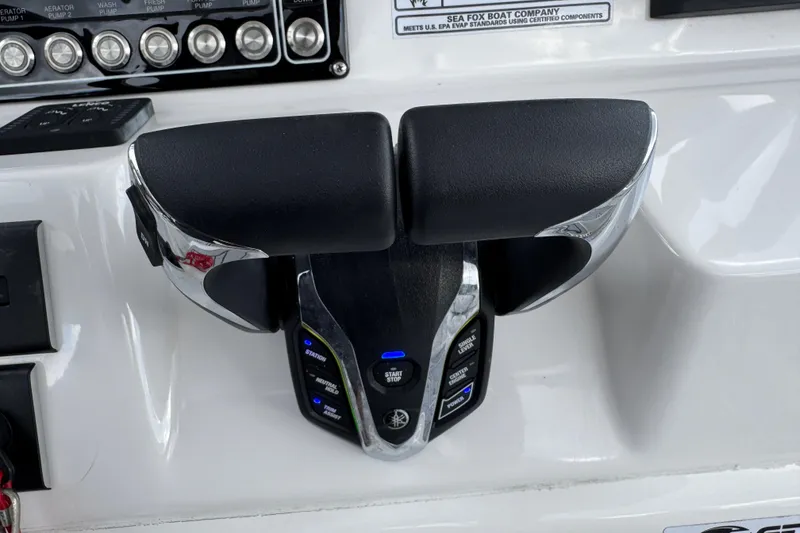 Slide: The Image of Throttle controls on 2025 Sea Fox 288 Commander boat dashboard. - 45