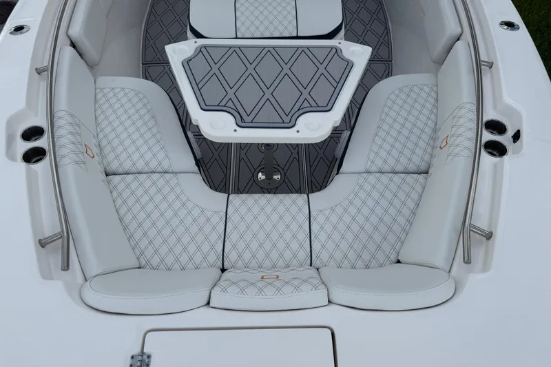 Slide: The Image of Luxurious seating area of 2025 Sea Fox 288 Commander boat with diamond-pattern upholstery. - 53