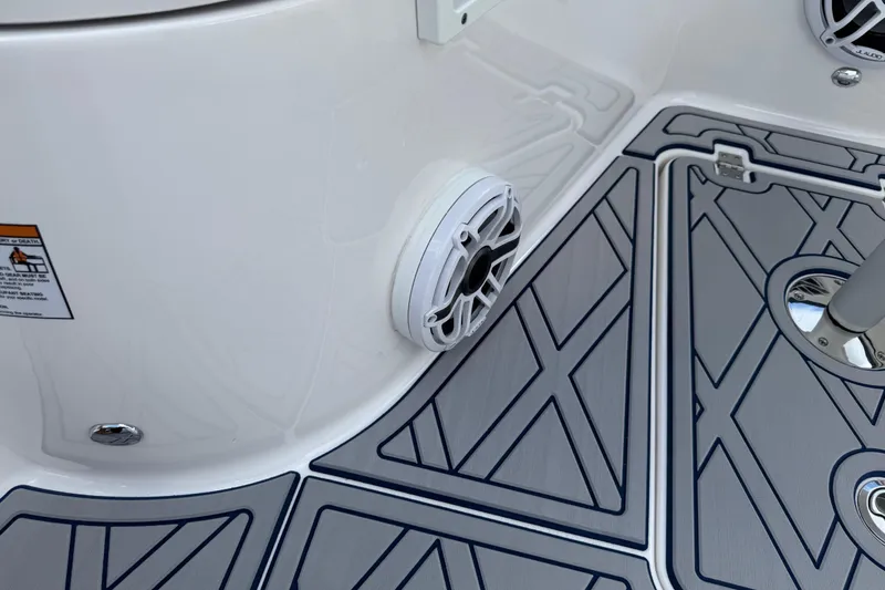 Slide: The Image of 2025 Sea Fox 288 Commander boat interior with speaker and patterned flooring. - 58