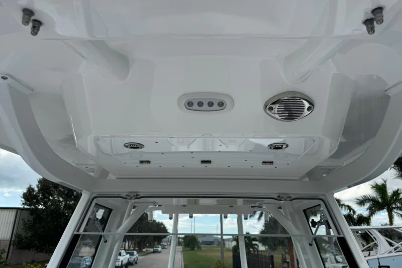 Slide: The Image of 2025 Sea Fox 288 Commander boat interior ceiling with speaker and lighting features. - 64