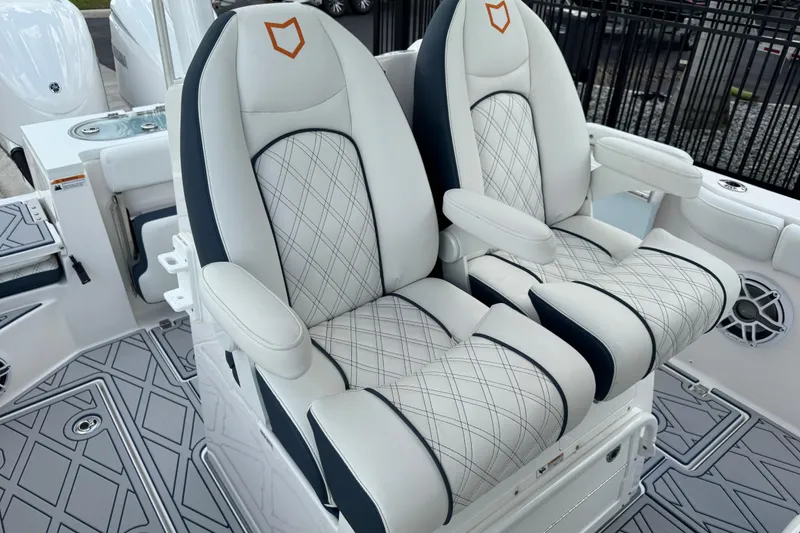 Slide: The Image of Luxury seating on 2025 Sea Fox 288 Commander boat, featuring elegant diamond-stitched upholstery. - 72