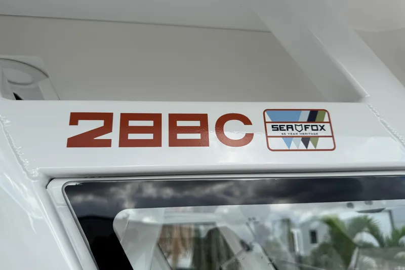 Slide: The Image of 2025 Sea Fox 288 Commander boat logo and branding detail. - 83
