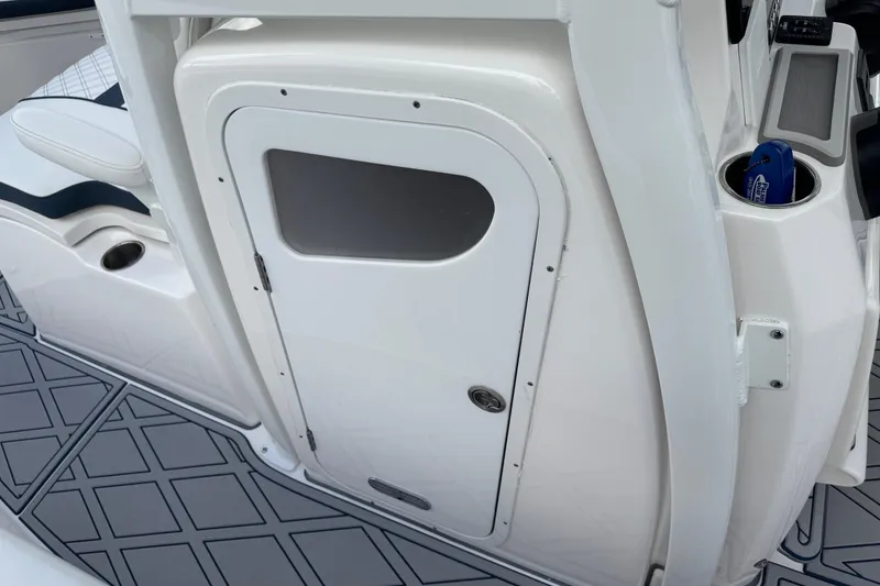 Slide: The Image of 2025 Sea Fox 288 Commander interior with storage compartment and modern design features. - 86
