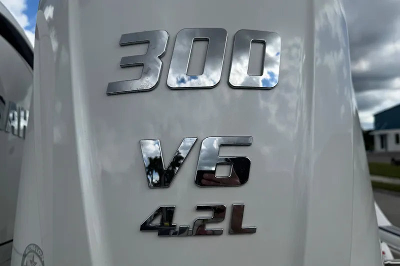 Slide: The Image of Close-up of 2025 Sea Fox 288 Commander engine, featuring 300 V6 4.2L specifications. - 9