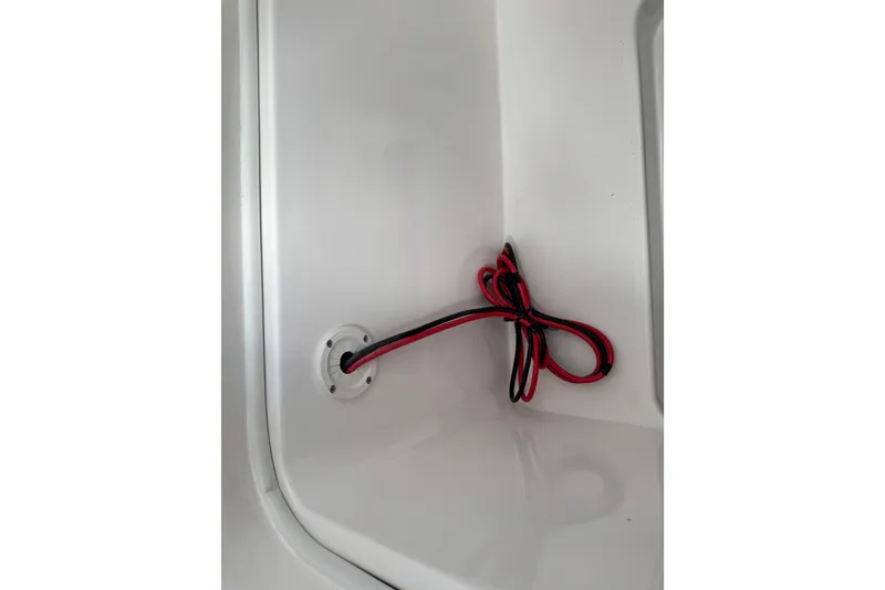 Slide: The Image of Interior wiring of 2025 Sea Fox 288 Commander boat, featuring red and black cables. - 90