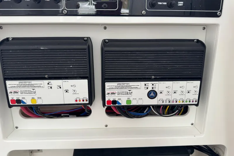 Slide: The Image of Electrical panel on a 2025 Sea Fox 288 Commander boat, featuring wiring and controls. - 94