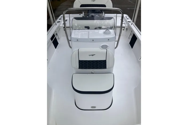 Slide: The Image of 2026 Tidewater 1910 Bay Max boat interior with seating and console. - 10