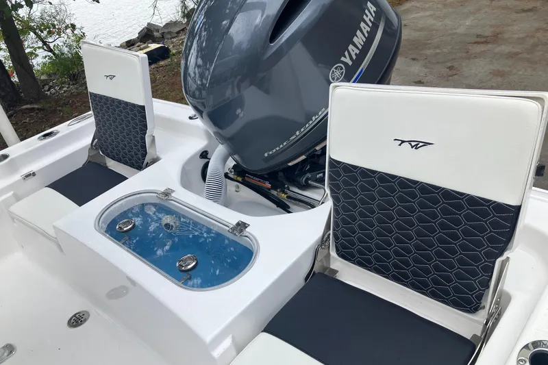 Slide: The Image of 2026 Tidewater 1910 Bay Max boat interior with Yamaha engine and stylish seating. - 14