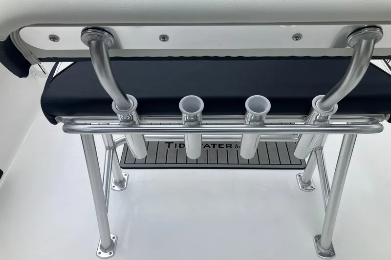 Slide: The Image of Tidewater 1910 Bay Max 2026 boat seat with rod holders and stainless steel frame. - 21