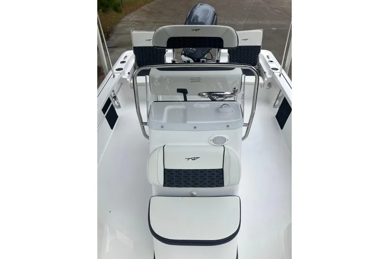 Slide: The Image of 2026 Tidewater 1910 Bay Max boat interior with sleek seating and modern console design. - 27