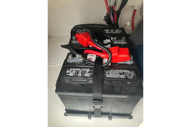 Slide: The Image of Battery setup in 2026 Tidewater 1910 Bay Max boat, featuring secure connections. - 30