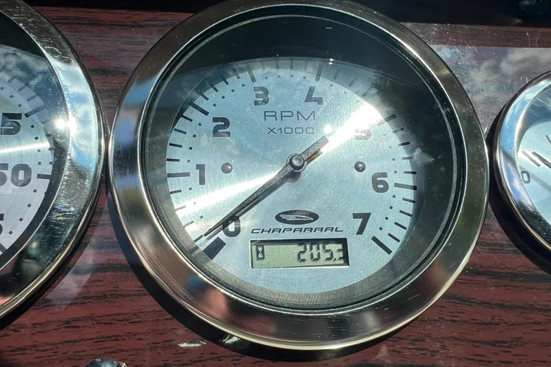 Slide: The Image of Close-up of a 2002 Chaparral Sunesta 243 RPM gauge displaying 243.2 hours. - 16