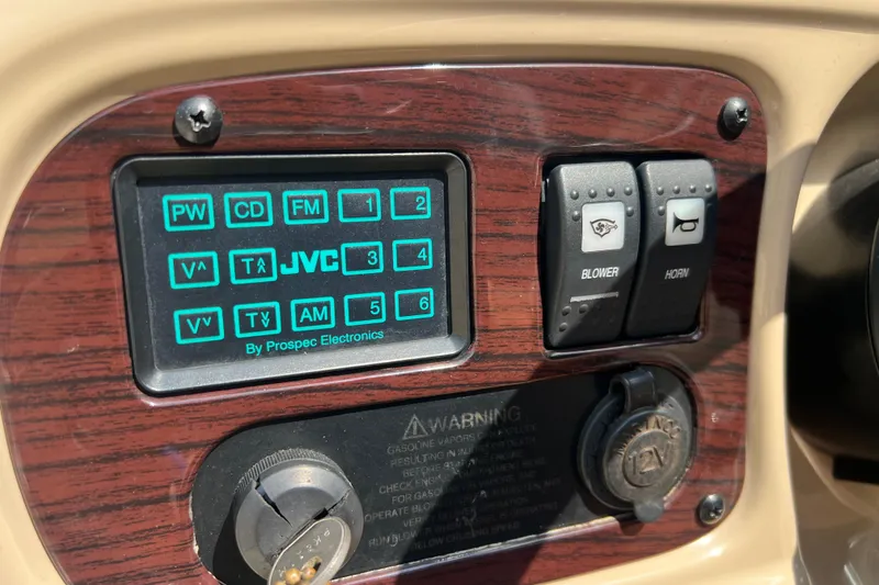 Slide: The Image of Control panel of a 2002 Chaparral Sunesta 243 boat with JVC audio system. - 20