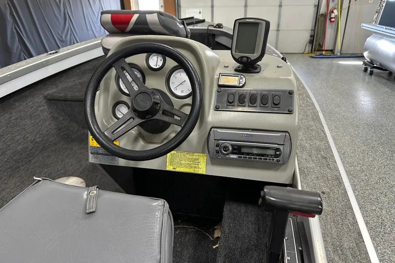 Slide: The Image of Kenwood stereo system in 1994 Alumacraft Classic 165 CS boat dashboard. - 12