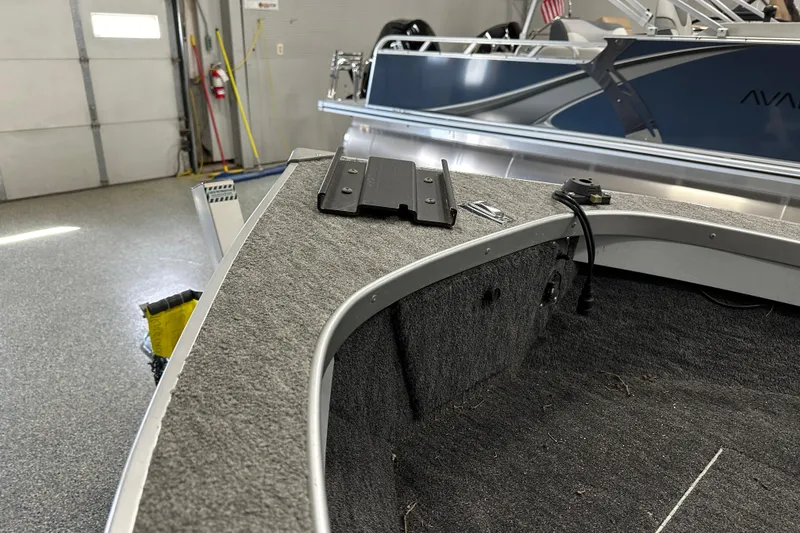 Slide: The Image of 1994 Alumacraft Classic 165 CS boat dashboard with steering wheel and controls. - 9