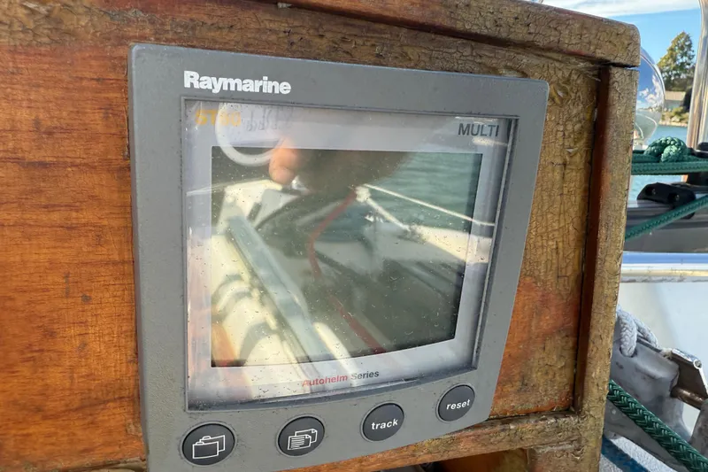 Slide: The Image of Raymarine display on 1997 Tartan 3800 sailboat, mounted on wooden panel. - 25