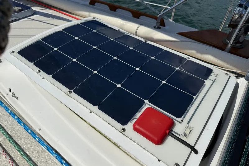 Slide: The Image of Solar panel on 1997 Tartan 3800 sailboat deck, harnessing renewable energy. - 30