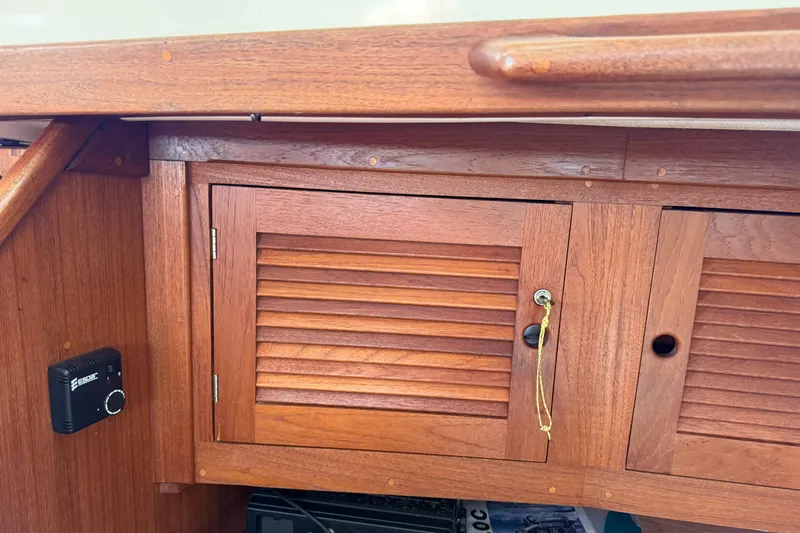 Slide: The Image of Wooden cabinet on a 1997 Tartan 3800 sailboat interior. - 56