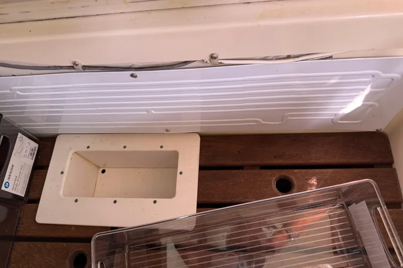 Slide: The Image of Interior of 1997 Tartan 3800 boat with wooden and plastic components. - 61