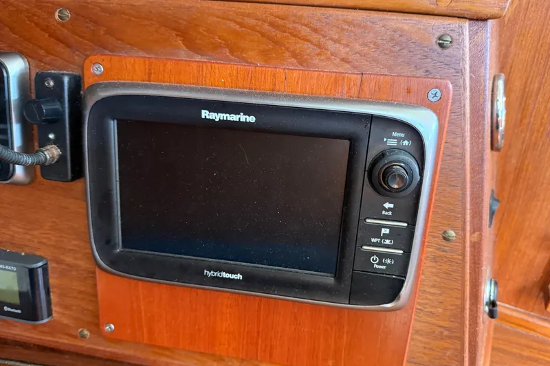 Slide: The Image of Raymarine display on 1997 Tartan 3800 sailboat, mounted on wooden panel. - 75