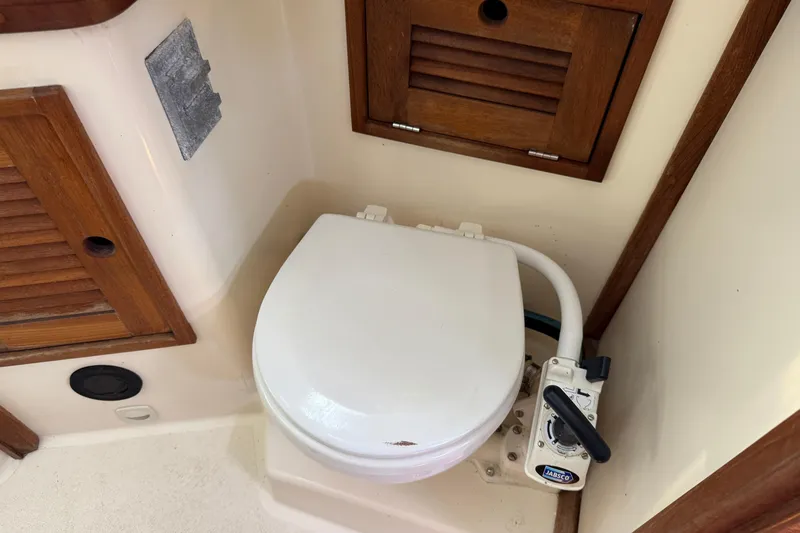 Slide: The Image of Boat bathroom with Jabsco marine toilet, Tartan 3800, 1997 model. - 83