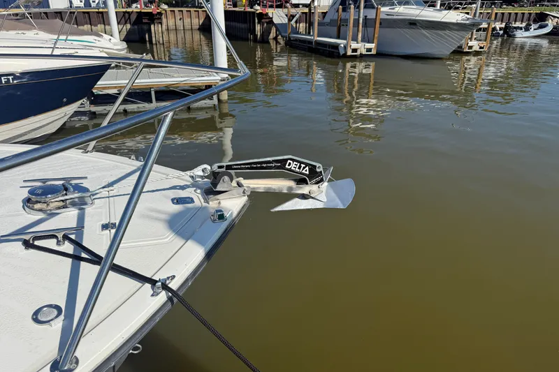 Slide: The Image of 2002 Carolina Classic 28 boat with Delta anchor at marina dock. - 7