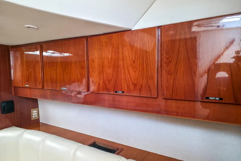 Slide: The Image of Interior view of 2005 Buddy Davis 35' Express with polished wooden cabinets. - 21